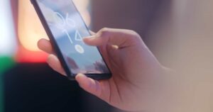 Photo by SCREEN POST: https://www.pexels.com/photo/a-person-holding-a-mobile-phone-12376016/