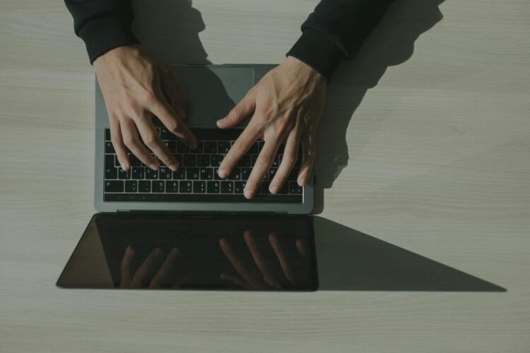 Photo by cottonbro studio: https://www.pexels.com/photo/hands-typing-on-a-laptop-keyboard-5483149/