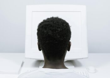 Photo by cottonbro studio: https://www.pexels.com/photo/person-with-afro-hair-using-a-computer-5185177/