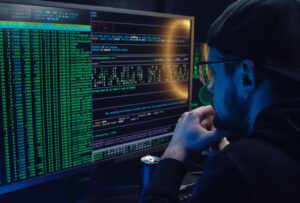 Photo by Mikhail Nilov: https://www.pexels.com/photo/a-man-looking-at-a-computer-screen-with-data-6963944/