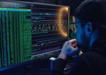 Photo by Mikhail Nilov: https://www.pexels.com/photo/a-man-looking-at-a-computer-screen-with-data-6963944/