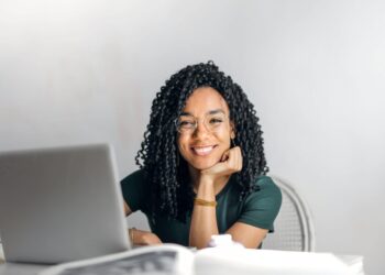 Photo by Andrea Piacquadio: https://www.pexels.com/photo/happy-ethnic-woman-sitting-at-table-with-laptop-3769021/