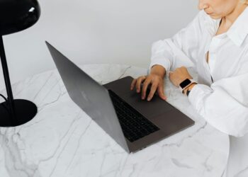 Photo by Karolina Kaboompics: https://www.pexels.com/photo/high-angle-view-of-woman-using-laptop-4968723/