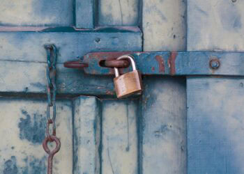 Photo by Pixabay: https://www.pexels.com/photo/gold-padlock-locking-door-164425/