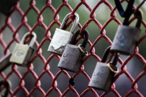 Photo by Wallace Silva: https://www.pexels.com/photo/locks-on-a-grill-17795353/