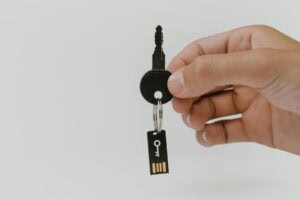 Photo by cottonbro studio: https://www.pexels.com/photo/close-up-shot-of-a-person-holding-a-key-5474292/