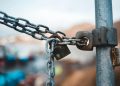 Photo by Erik Mclean: https://www.pexels.com/photo/metal-chain-with-lock-on-street-6095837/