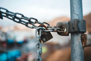 Photo by Erik Mclean: https://www.pexels.com/photo/metal-chain-with-lock-on-street-6095837/