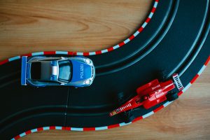 Photo by Markus Spiske: https://www.pexels.com/photo/toy-cars-on-race-track-on-wooden-table-3567681/